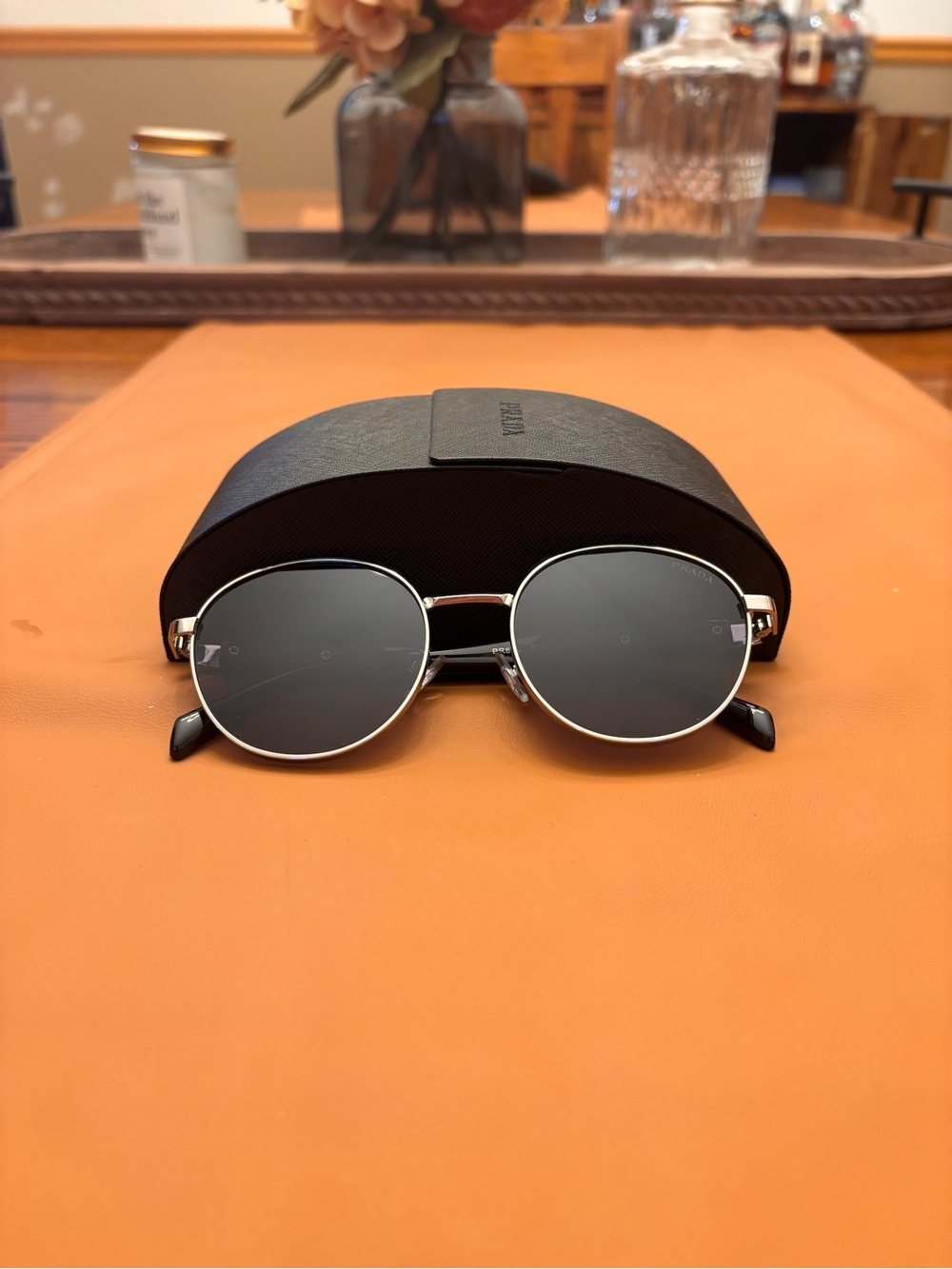 Prada Women's Round Sunglasses in Silver and Black